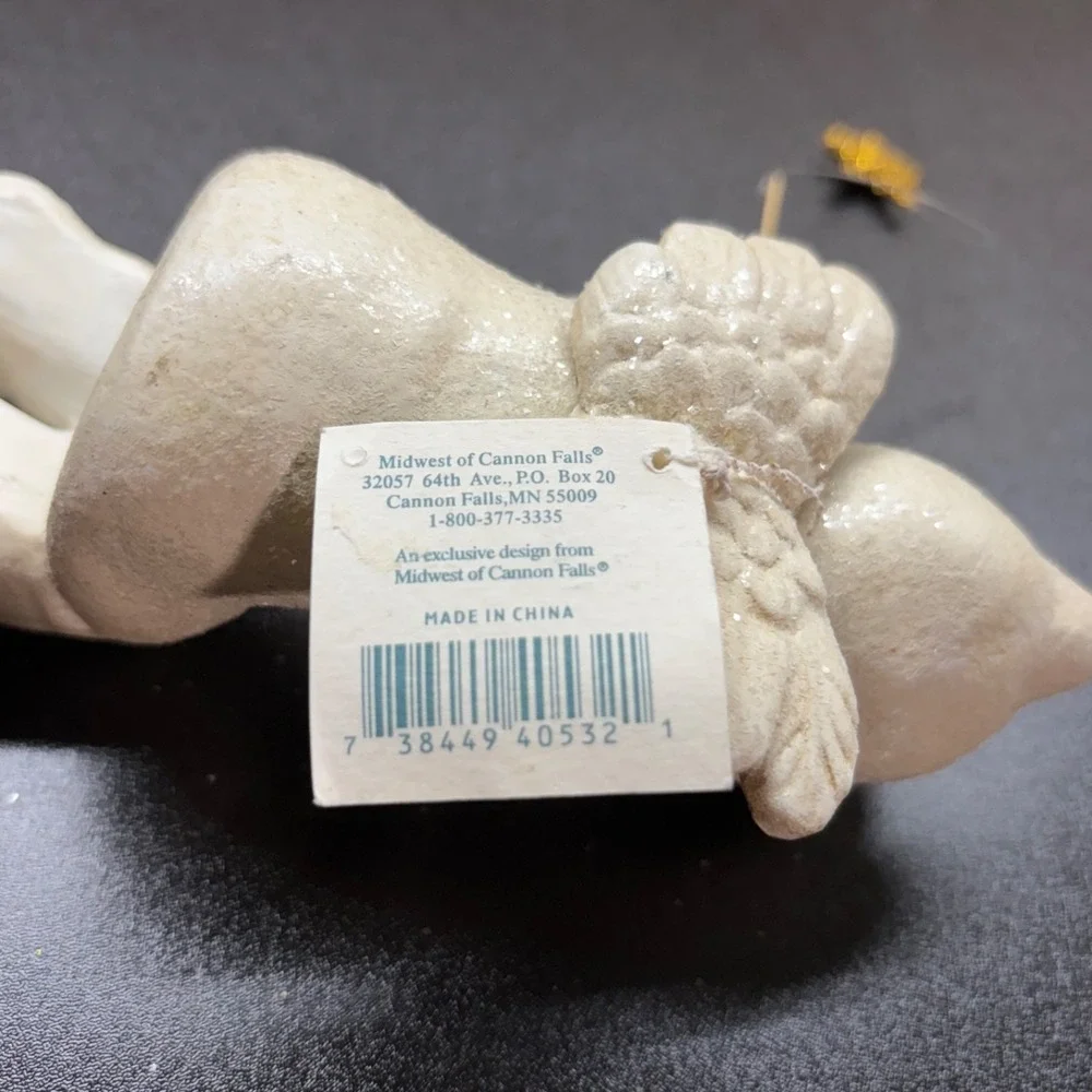 Midwest of canon falls shelf angel with fishing pole & star on the end figurine